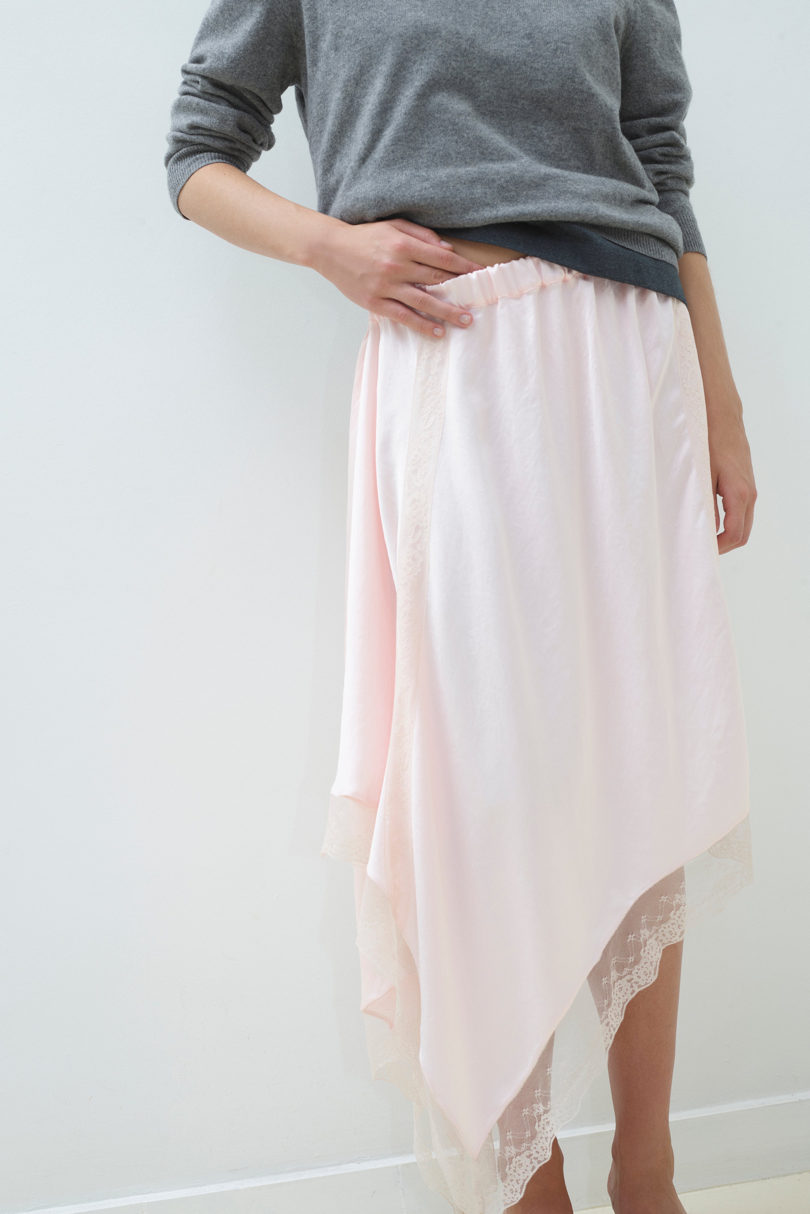 ASYMMETRICAL LACE HEM SKIRT WITH ELASTIC WAISTBAND