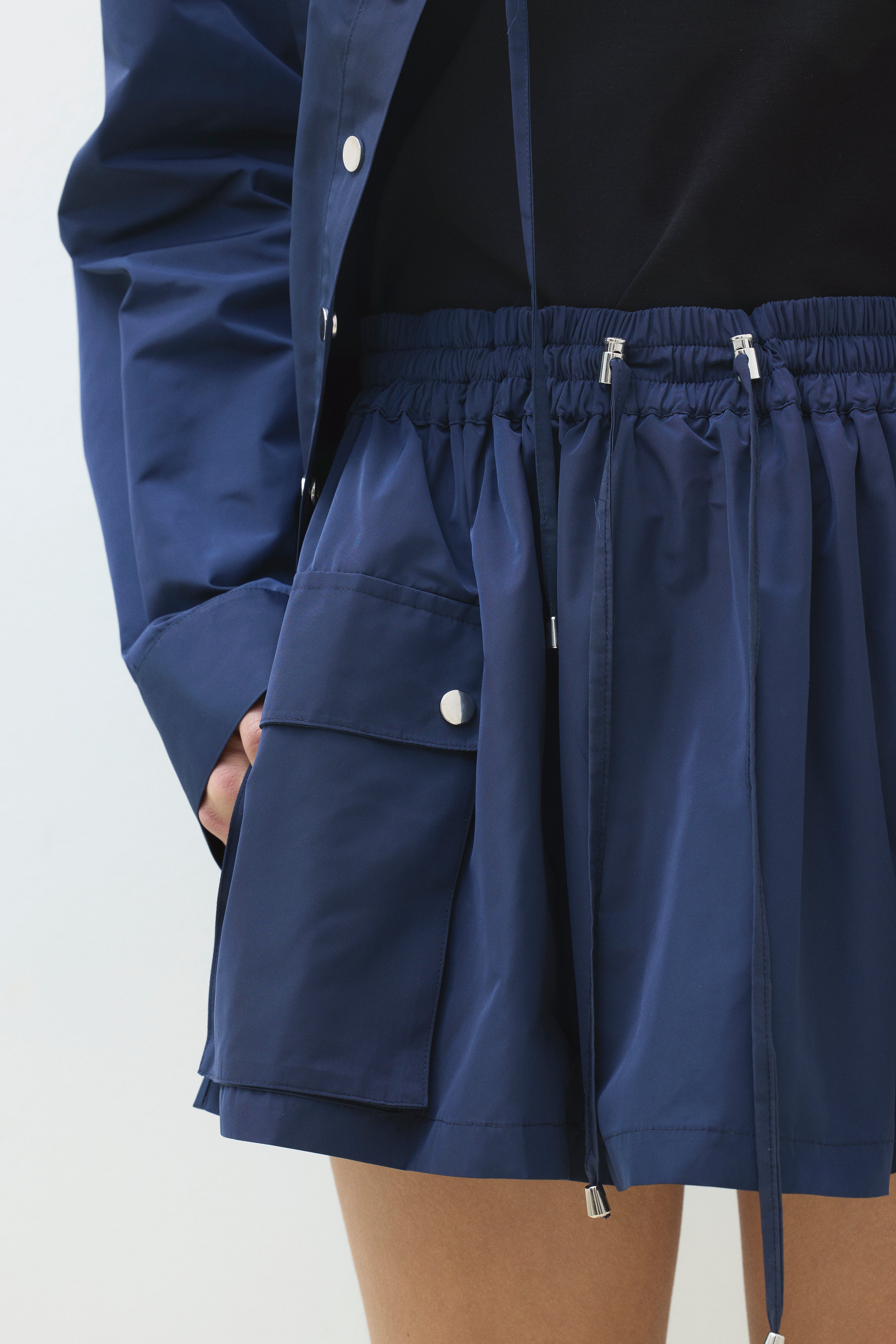 MINI SKIRT WITH ELASTIC WAISTBAND AND SIDE POCKETS