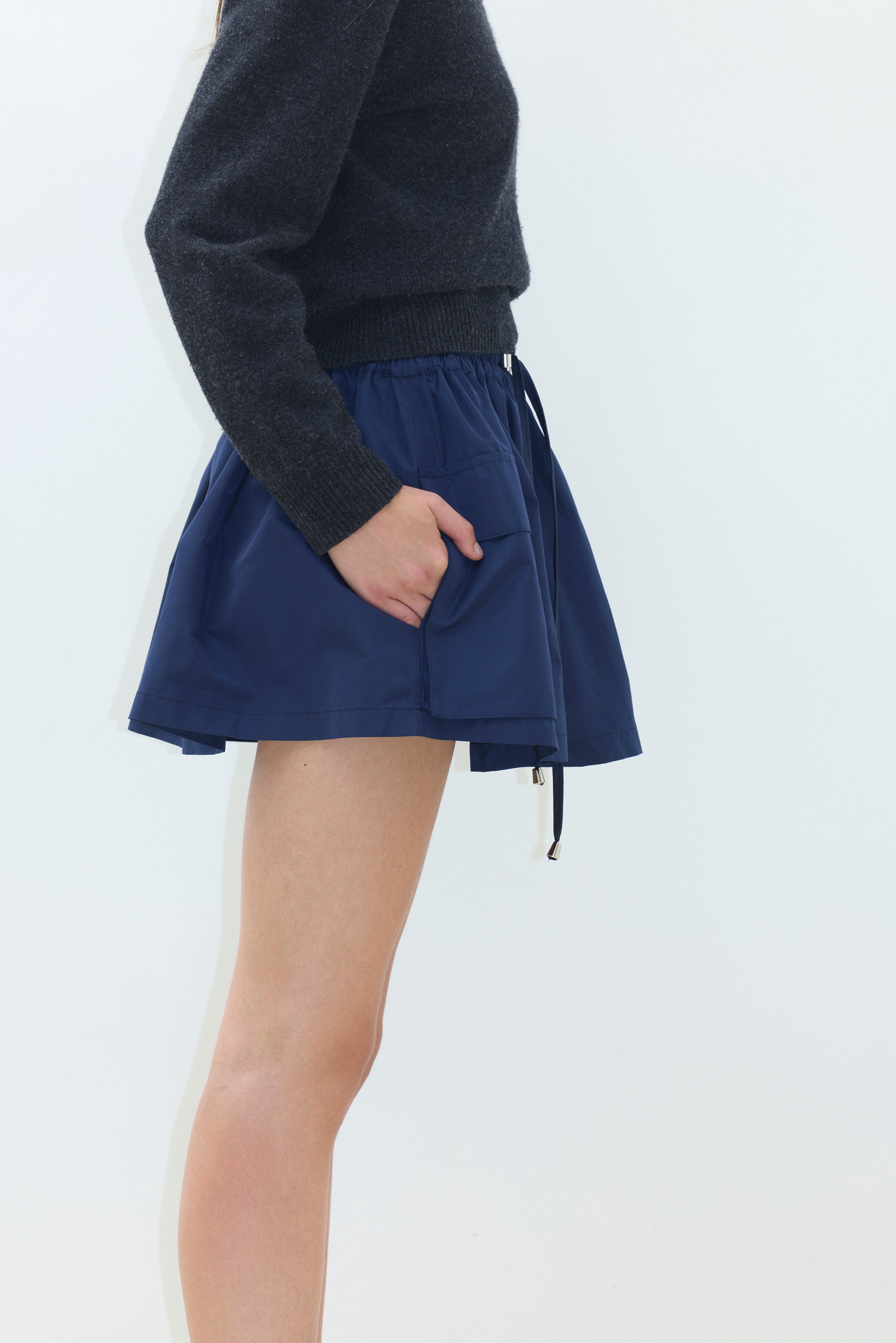 MINI SKIRT WITH ELASTIC WAISTBAND AND SIDE POCKETS