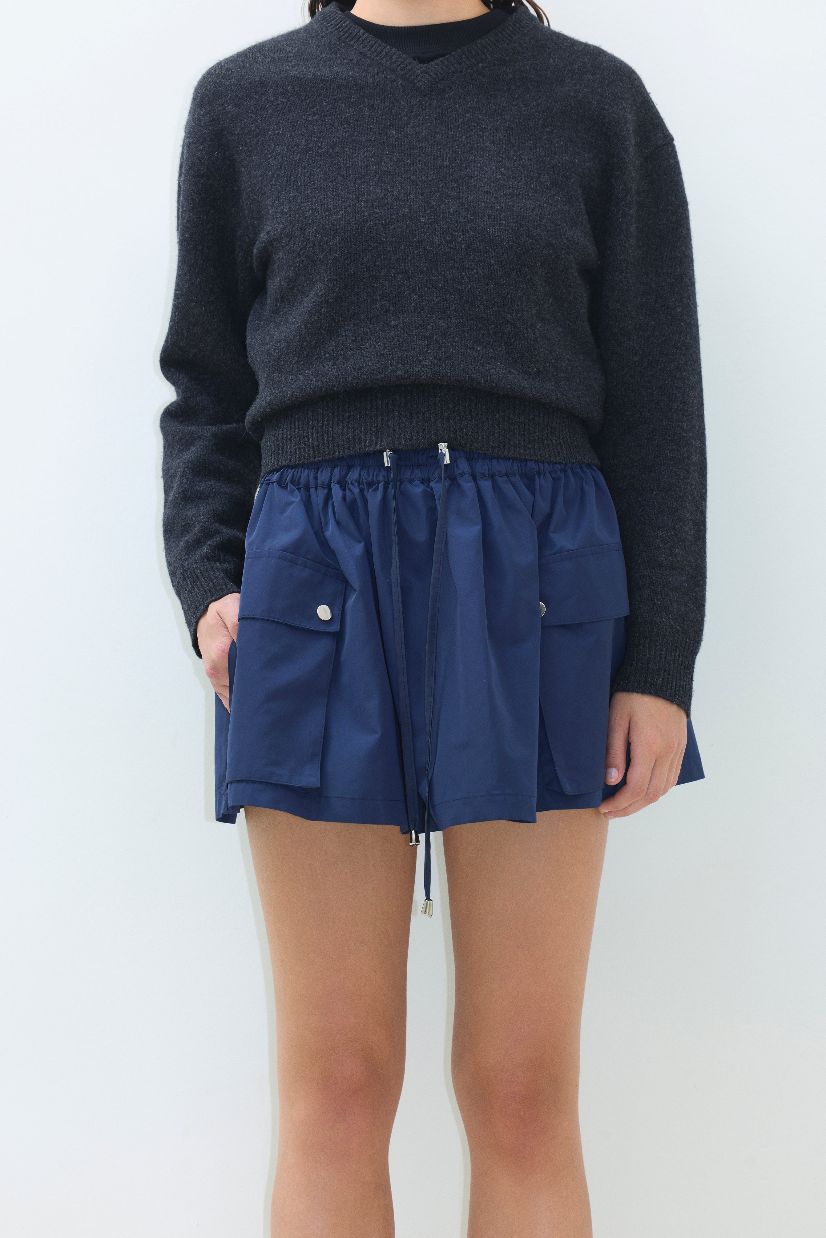 MINI SKIRT WITH ELASTIC WAISTBAND AND SIDE POCKETS